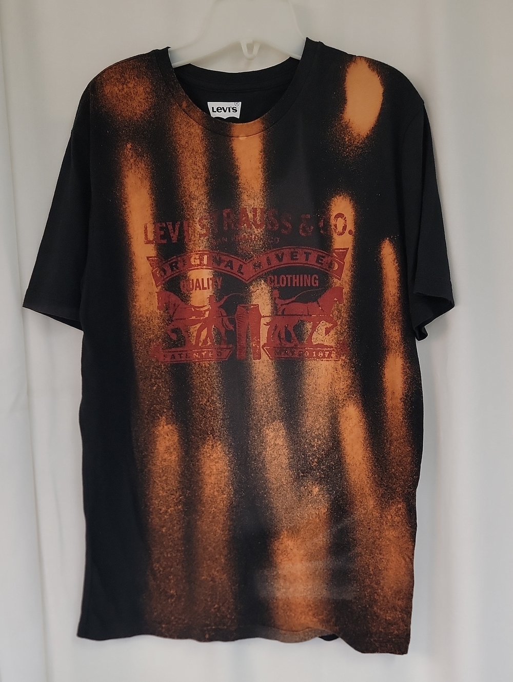Levi's Black T-Shirt with Orange Bleach Graphic